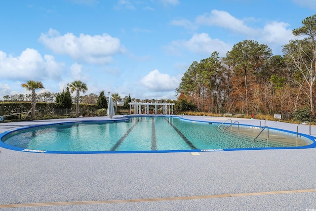 view of pool with a pergola