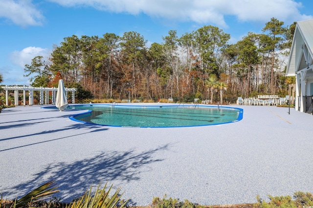 view of pool with a pergola