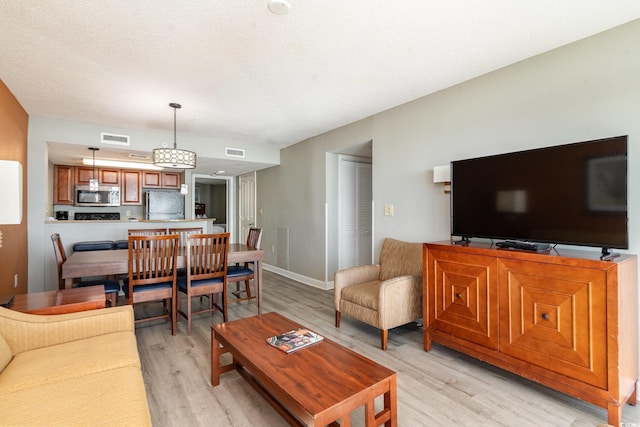 living room with light wood-type flooring