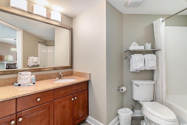 full bathroom featuring shower / bathtub combination with curtain, vanity, and toilet