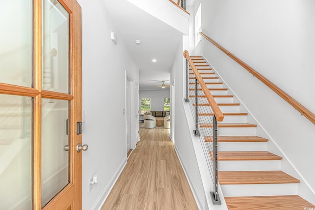 210 26th Ave S, Myrtle Beach, SC 29577 - staircase featuring baseboards, wood finished floors, and recessed lighting