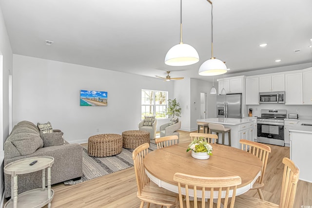 210 26th Ave S, Myrtle Beach, SC 29577 - dining area with baseboards, recessed lighting, a ceiling fan, and light wood-style flooring