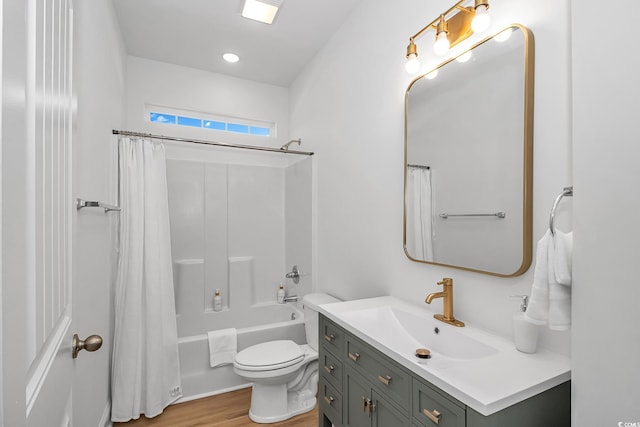 210 26th Ave S, Myrtle Beach, SC 29577 - full bathroom featuring wood finished floors, shower / bath combo with shower curtain, toilet, and vanity