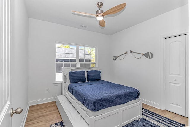 210 26th Ave S, Myrtle Beach, SC 29577 - bedroom with light wood-type flooring, baseboards, a ceiling fan, and visible vents