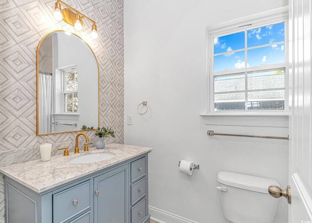 210 26th Ave S, Myrtle Beach, SC 29577 - full bath with backsplash, baseboards, toilet, and vanity
