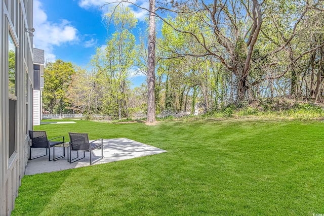 210 26th Ave S, Myrtle Beach, SC 29577 - view of yard featuring a patio area