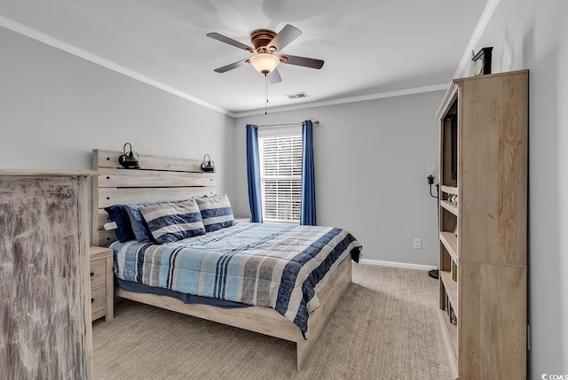 bedroom with light carpet, crown molding, and ceiling fan