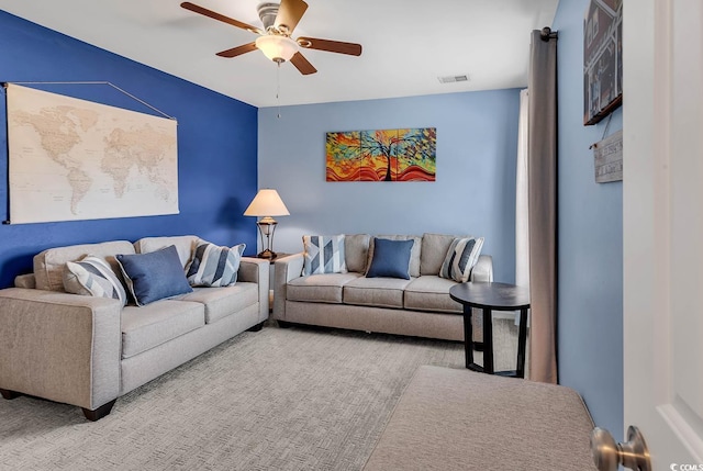 living room featuring ceiling fan