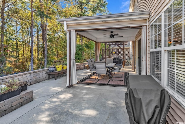 view of patio / terrace with grilling area and ceiling fan