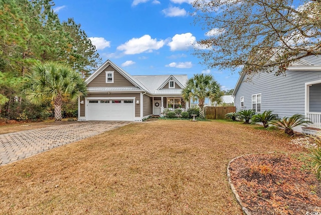 view of front of property featuring a garage