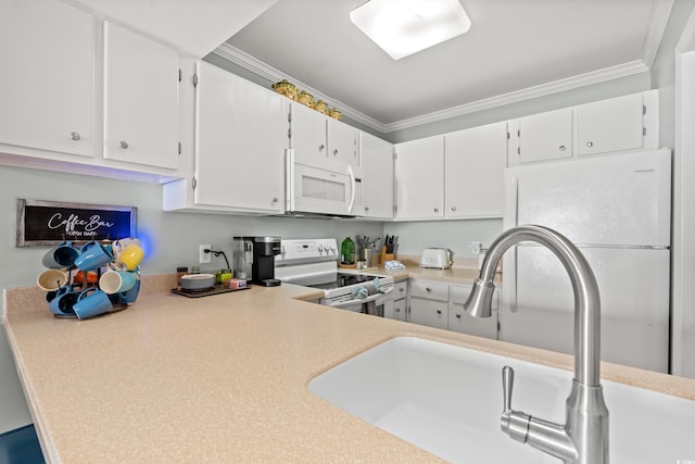 kitchen featuring white cabinets, white appliances, crown molding, and sink