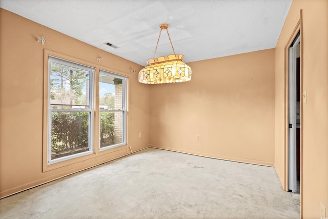 view of carpeted spare room