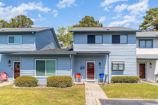 775 Plantation Dr Unit 59, Little River, SC 29566 - view of property with a front yard and roof with shingles