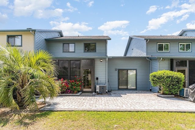 775 Plantation Dr Unit 59, Little River, SC 29566 - back of house featuring a patio and a sunroom