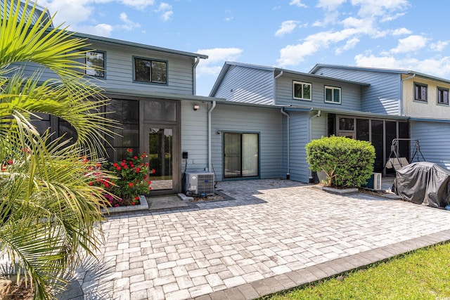 775 Plantation Dr Unit 59, Little River, SC 29566 - back of house with a sunroom and a patio area