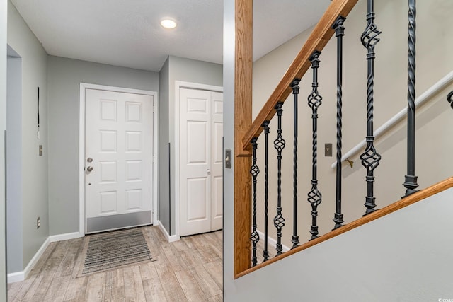 775 Plantation Dr Unit 59, Little River, SC 29566 - entryway with light wood finished floors, stairs, and recessed lighting