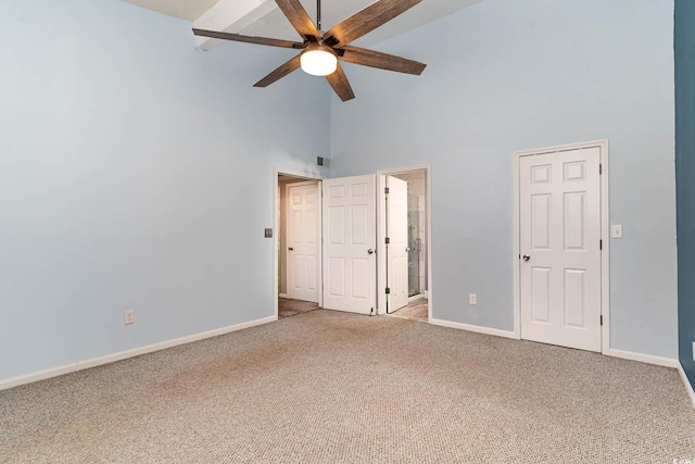 775 Plantation Dr Unit 59, Little River, SC 29566 - unfurnished bedroom with high vaulted ceiling, carpet floors, connected bathroom, and ceiling fan