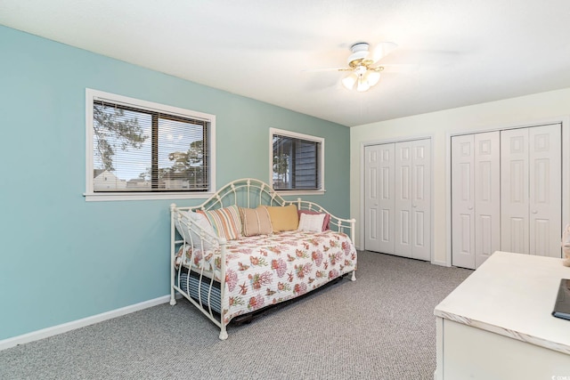 775 Plantation Dr Unit 59, Little River, SC 29566 - carpeted bedroom with two closets and a ceiling fan