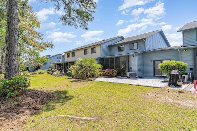 775 Plantation Dr Unit 59, Little River, SC 29566 - back of property with a patio and a lawn