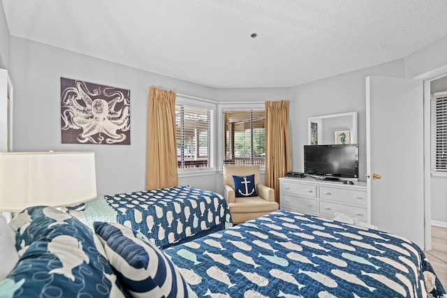 bedroom with a textured ceiling