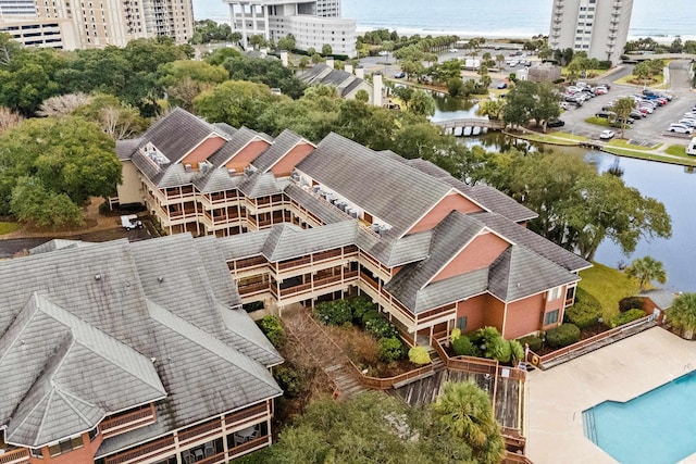 drone / aerial view with a water view