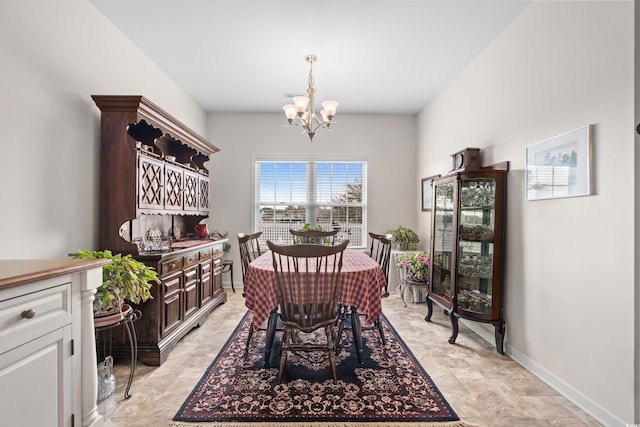 dining room featuring a notable chandelier