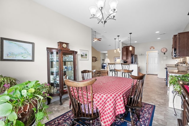 dining area with ceiling fan with notable chandelier