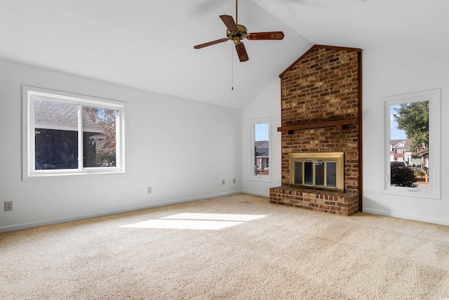 unfurnished living room with ceiling fan, a fireplace, carpet floors, and lofted ceiling