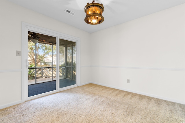 spare room featuring carpet floors