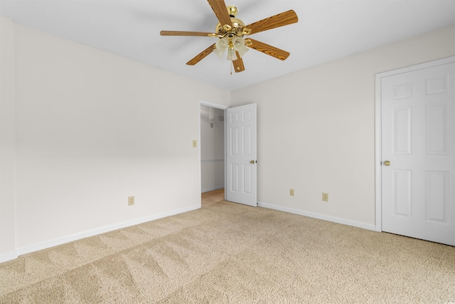 unfurnished bedroom with carpet flooring and ceiling fan