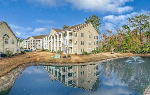 view of building exterior featuring a water view