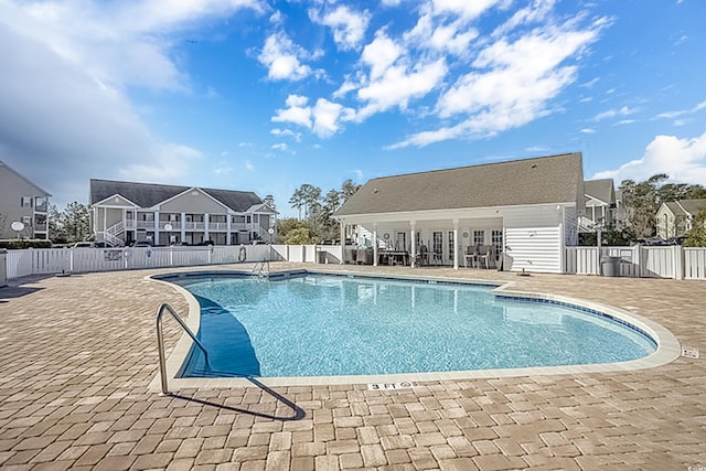 view of pool featuring a patio area