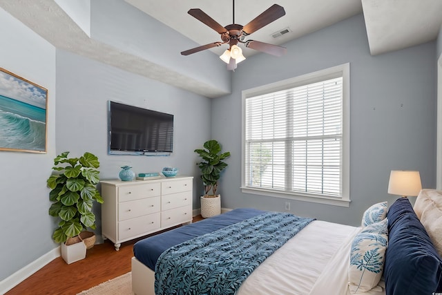 bedroom featuring ceiling fan and wood-type flooring