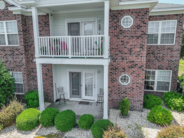 property entrance with a balcony