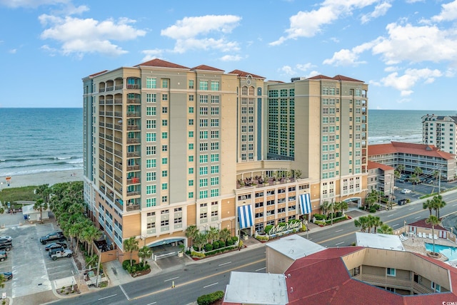 view of building exterior featuring a water view