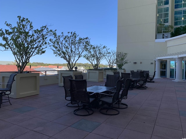 603 S Ocean Blvd Unit 1002, North Myrtle Beach, SC 29582 - view of patio featuring outdoor dining area