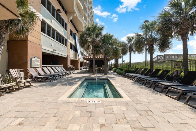 603 S Ocean Blvd Unit 1002, North Myrtle Beach, SC 29582 - view of swimming pool featuring a patio area