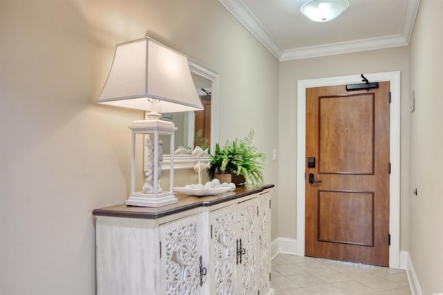 603 S Ocean Blvd Unit 1002, North Myrtle Beach, SC 29582 - entryway featuring crown molding, light tile patterned floors, and baseboards
