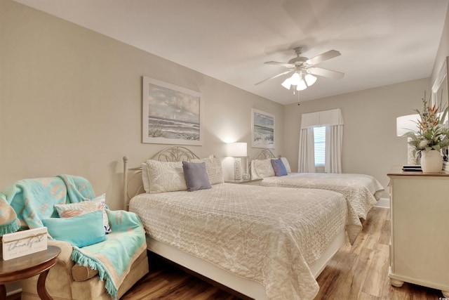603 S Ocean Blvd Unit 1002, North Myrtle Beach, SC 29582 - bedroom with wood finished floors and ceiling fan