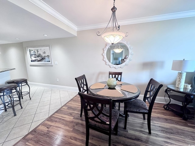 603 S Ocean Blvd Unit 1002, North Myrtle Beach, SC 29582 - dining area with baseboards, crown molding, light wood finished floors, and recessed lighting