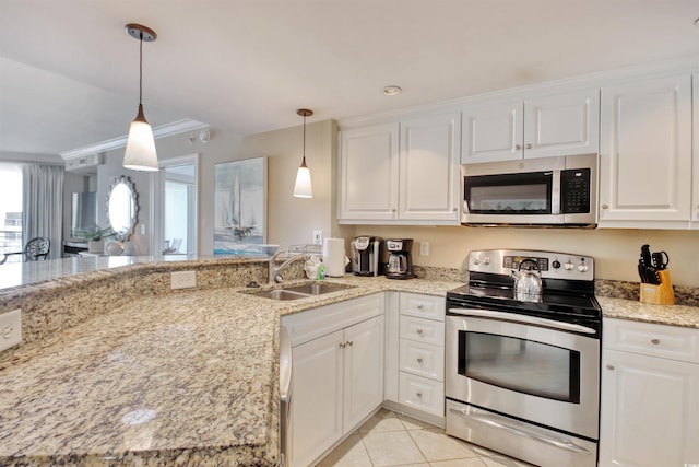 603 S Ocean Blvd Unit 1002, North Myrtle Beach, SC 29582 - kitchen with appliances with stainless steel finishes, a sink, white cabinets, light tile patterned floors, and ornamental molding