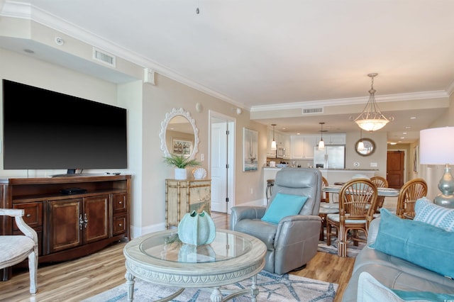 603 S Ocean Blvd Unit 1002, North Myrtle Beach, SC 29582 - living area featuring light wood-style flooring and ornamental molding