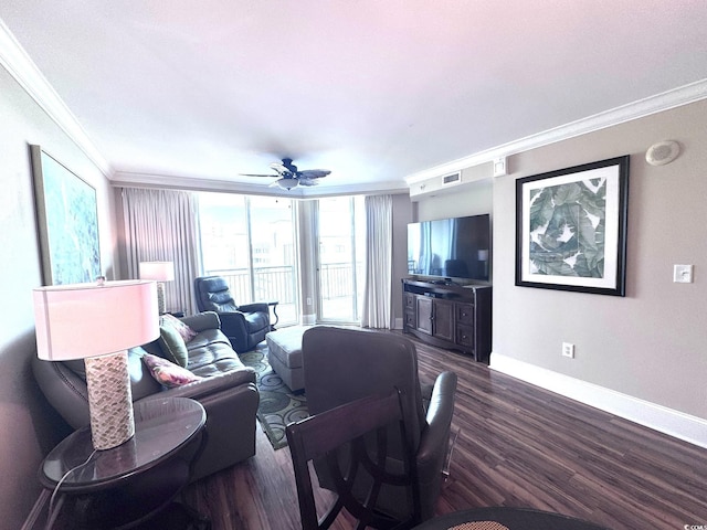 living room with ceiling fan, dark hardwood / wood-style flooring, and ornamental molding