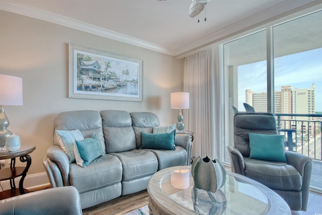 603 S Ocean Blvd Unit 1002, North Myrtle Beach, SC 29582 - living room featuring crown molding, a ceiling fan, baseboards, wood finished floors, and a city view