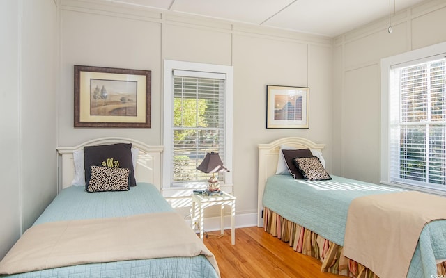 bedroom featuring hardwood / wood-style flooring