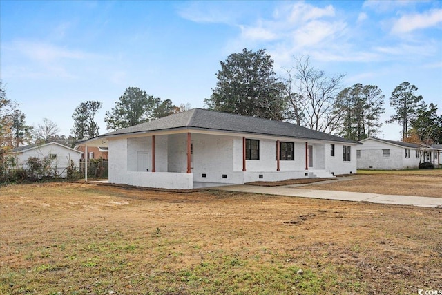 ranch-style home with a front lawn