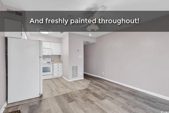 kitchen featuring white cabinets, ceiling fan, light hardwood / wood-style floors, and white appliances