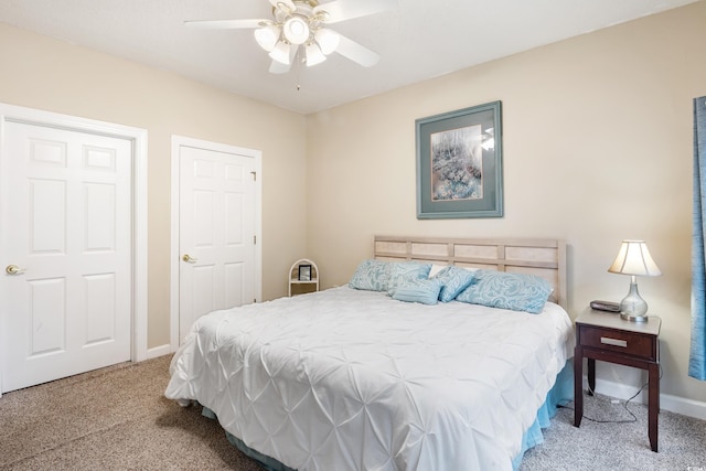 carpeted bedroom with ceiling fan