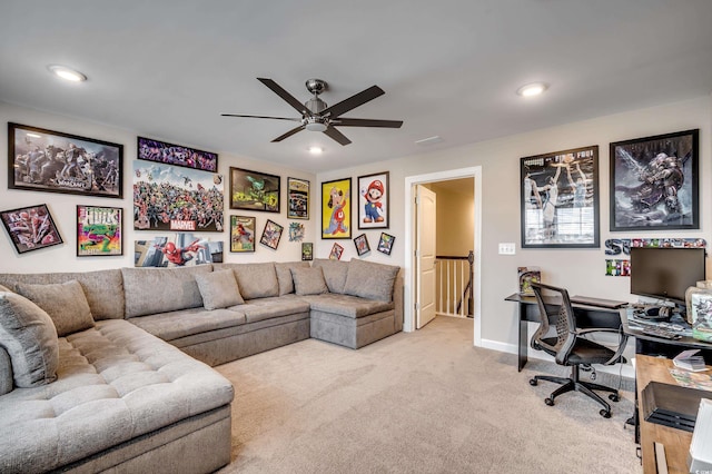 carpeted living room featuring baseboards, a ceiling fan, and recessed lighting