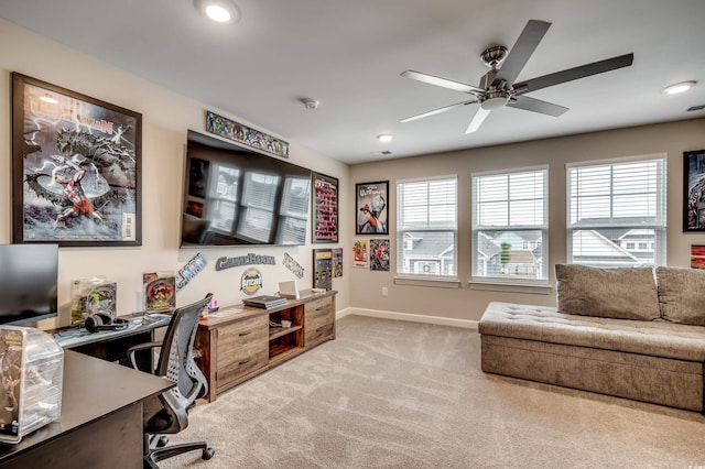 office featuring visible vents, carpet flooring, a ceiling fan, and baseboards